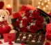 Beautiful romantic gift arrangement featuring fresh flowers, chocolates, teddy bear, gift box, candles, and heart-themed decorations, showcasing affordable surprise gift ideas available for online delivery across Pakistan.